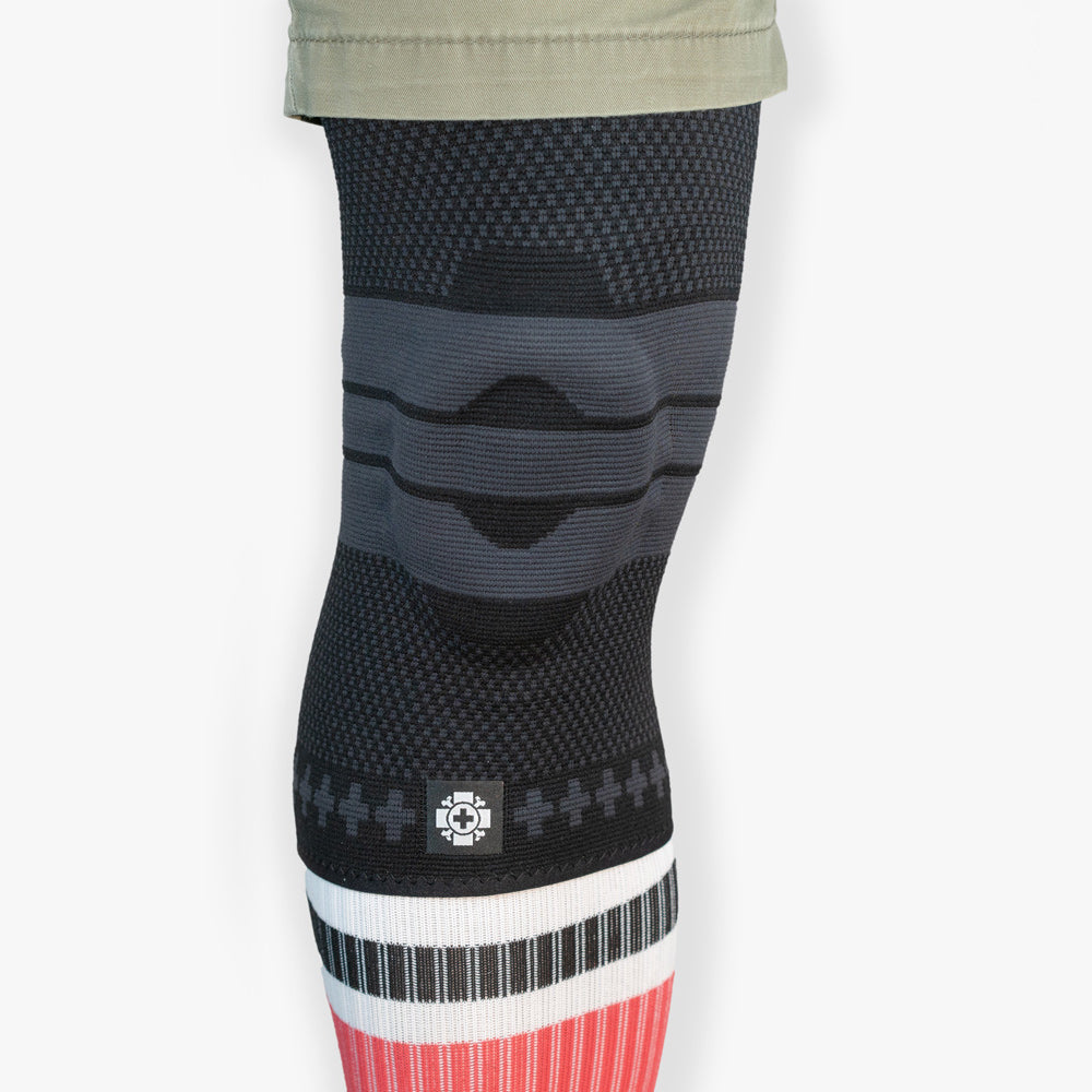 Old Bones Therapy Compression Knee Sleeve in Black — joint stabilization and support